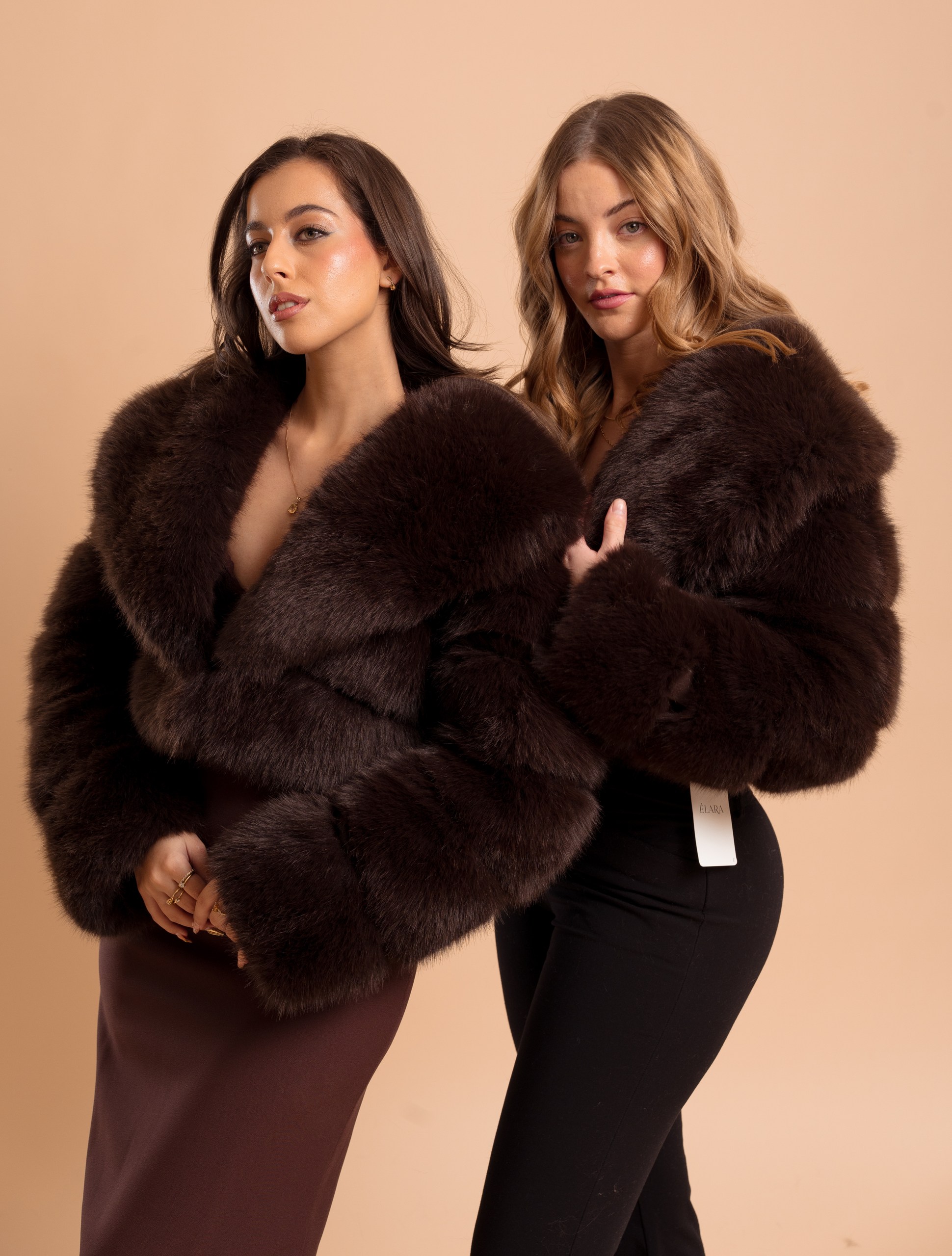 Two models in the Sofia faux fur jacket in chocolate brown, cropped length, front view